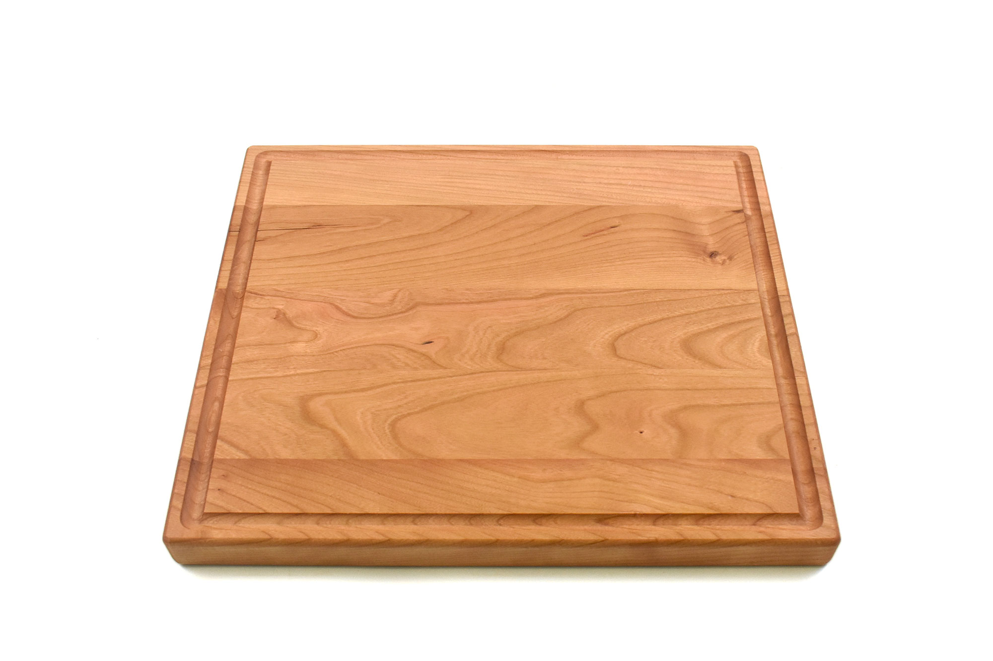 Square cherry cutting board with rounded corners & juice groove