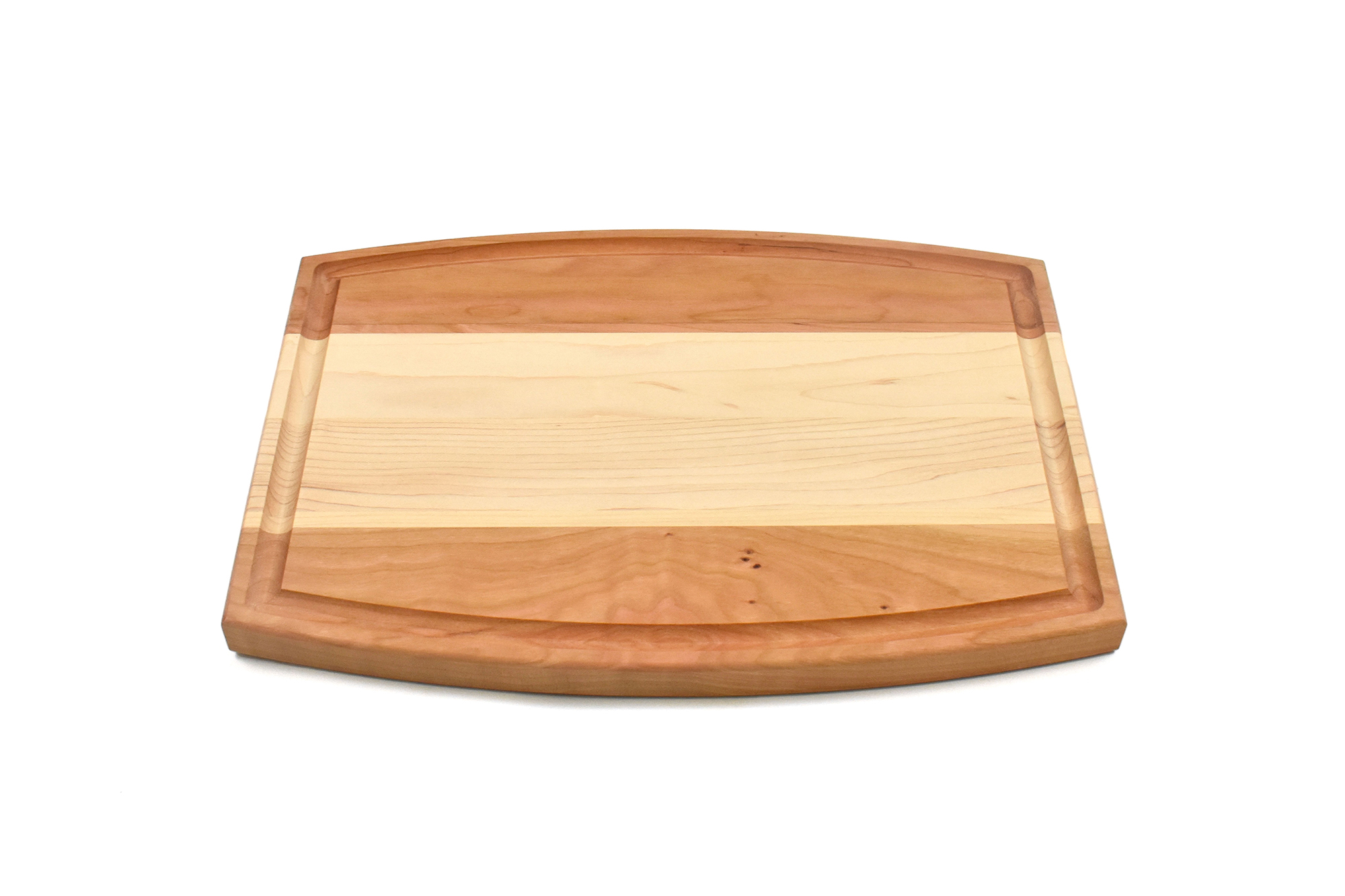 Arched Multi wood species cutting board with maple in the middle